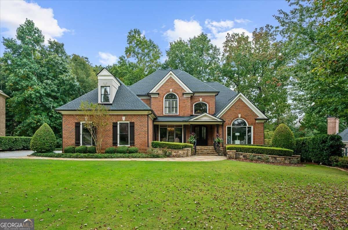 5 bedroom, 4.5 bathroom, 5,336 sq ft single family residence for sale at 10020 Normandy Lane, Suwanee, GA 30024 — photo 1 of 80