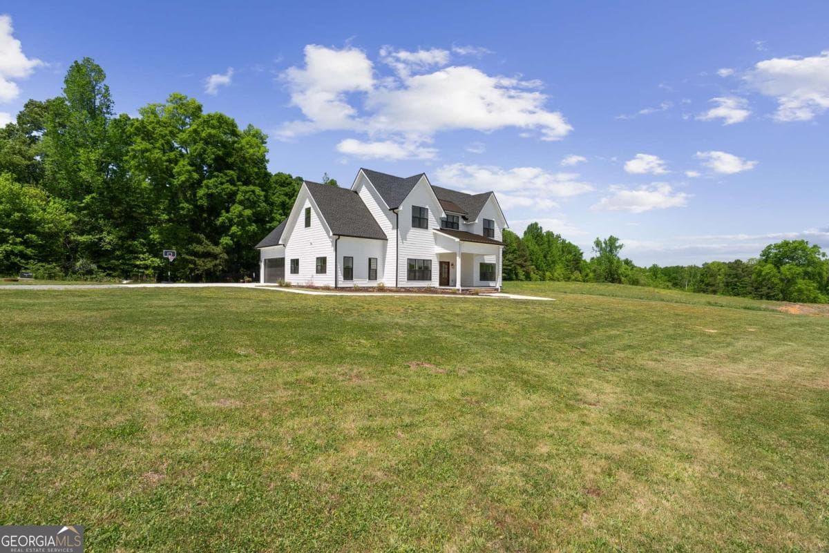 4 bedroom, 3.5 bathroom, 3,813 sq ft single family residence for sale at 876 Cline Road, Resaca, GA 30735 — photo 4