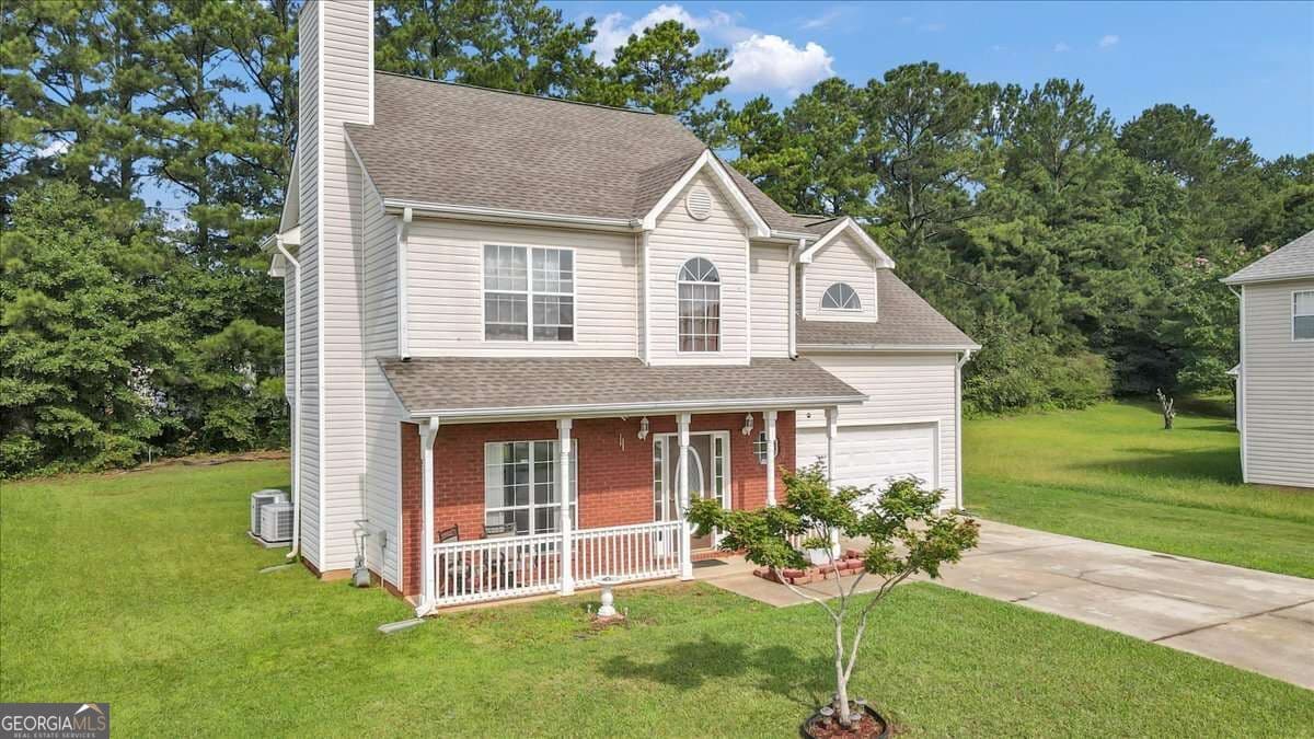 4 bedroom, 2.5 bathroom single family residence for sale at 141 Derby Drive, Riverdale, GA 30274 — photo 3