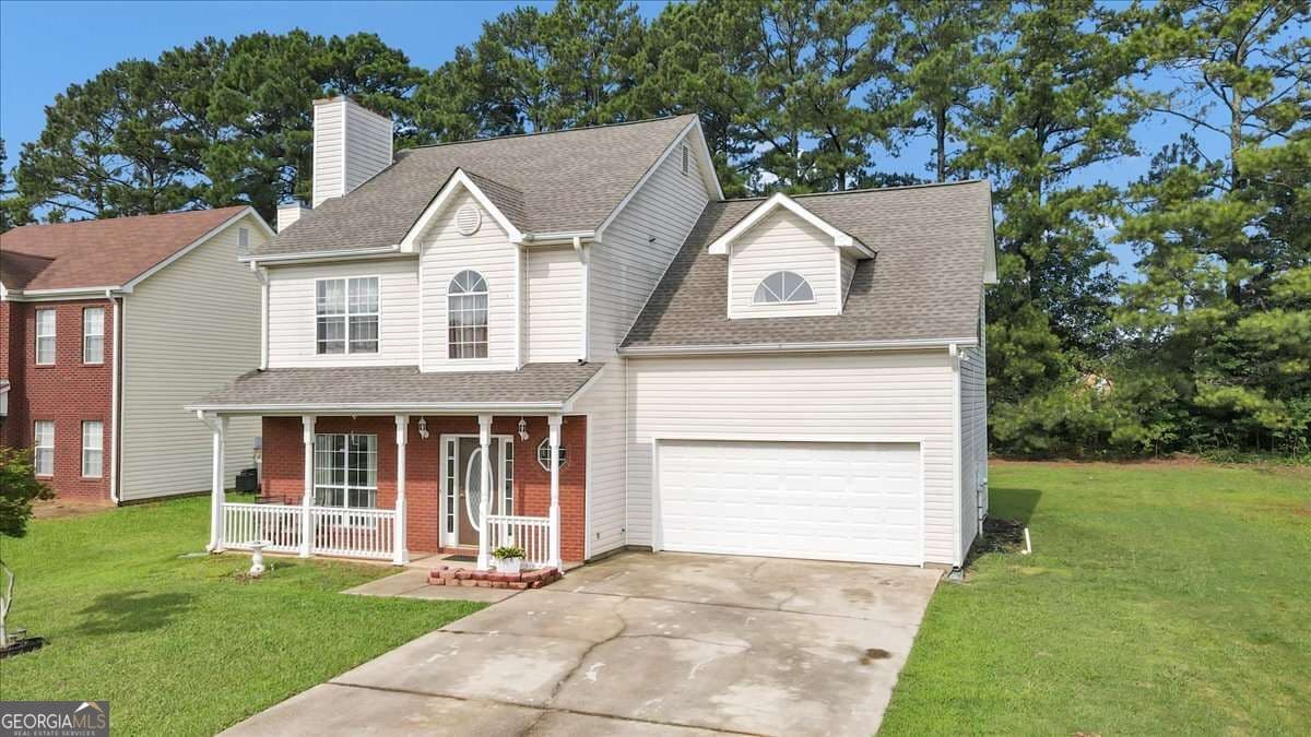 4 bedroom, 2.5 bathroom single family residence for sale at 141 Derby Drive, Riverdale, GA 30274 — photo 4