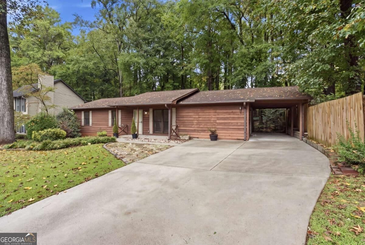 4 bedroom, 2 bathroom single family residence for rent at 3095 Woodland Drive, Kennesaw, GA 30152 for $2,300 a month — photo 2