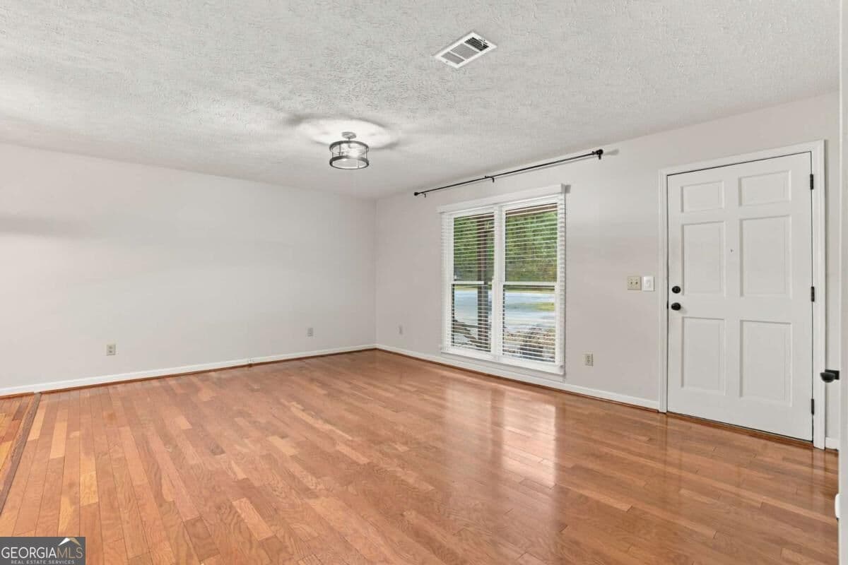 4 bedroom, 2 bathroom single family residence for rent at 3095 Woodland Drive, Kennesaw, GA 30152 for $2,300 a month — photo 6