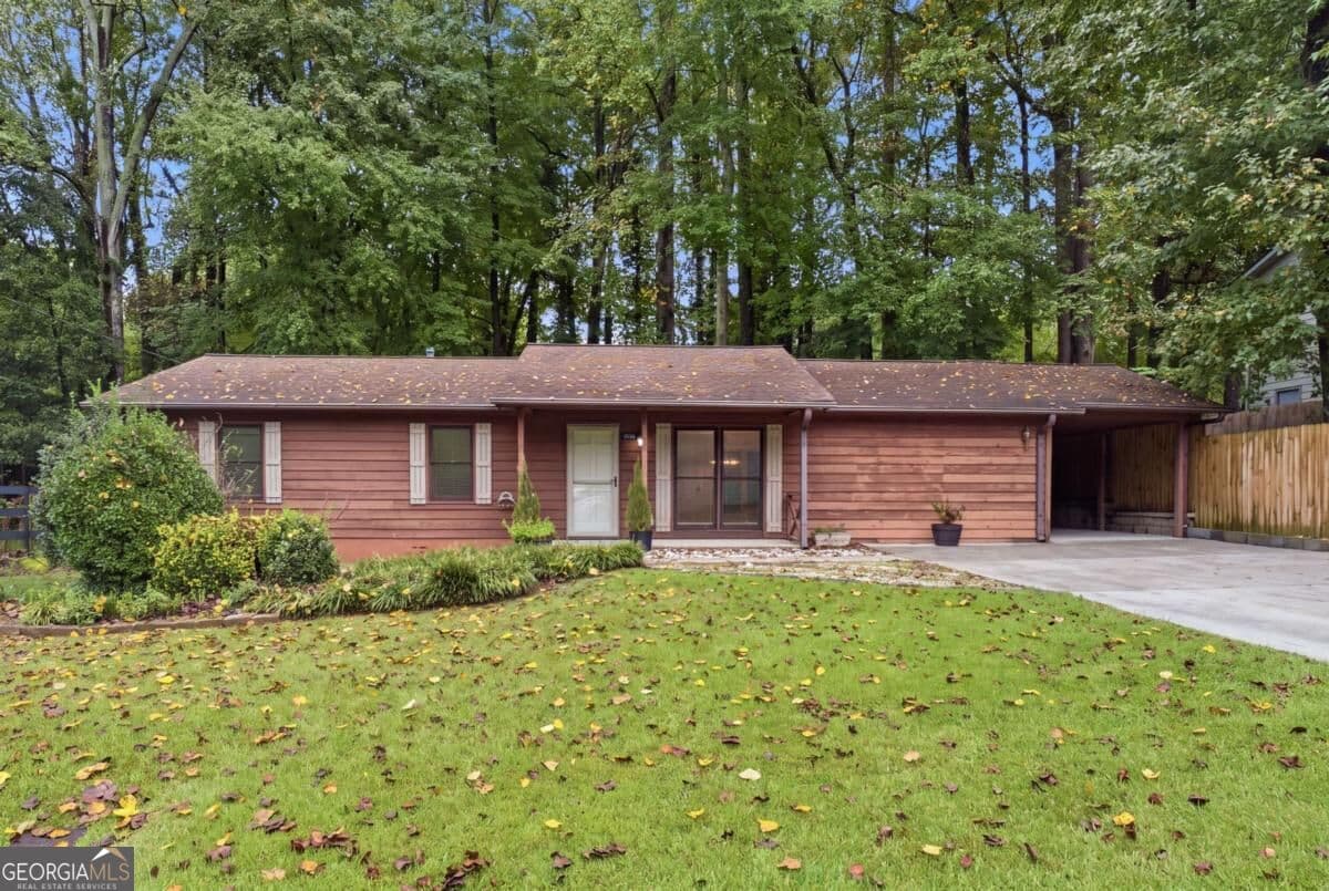 4 bedroom, 2 bathroom single family residence for rent at 3095 Woodland Drive, Kennesaw, GA 30152 for $2,300 a month — photo 1 of 49