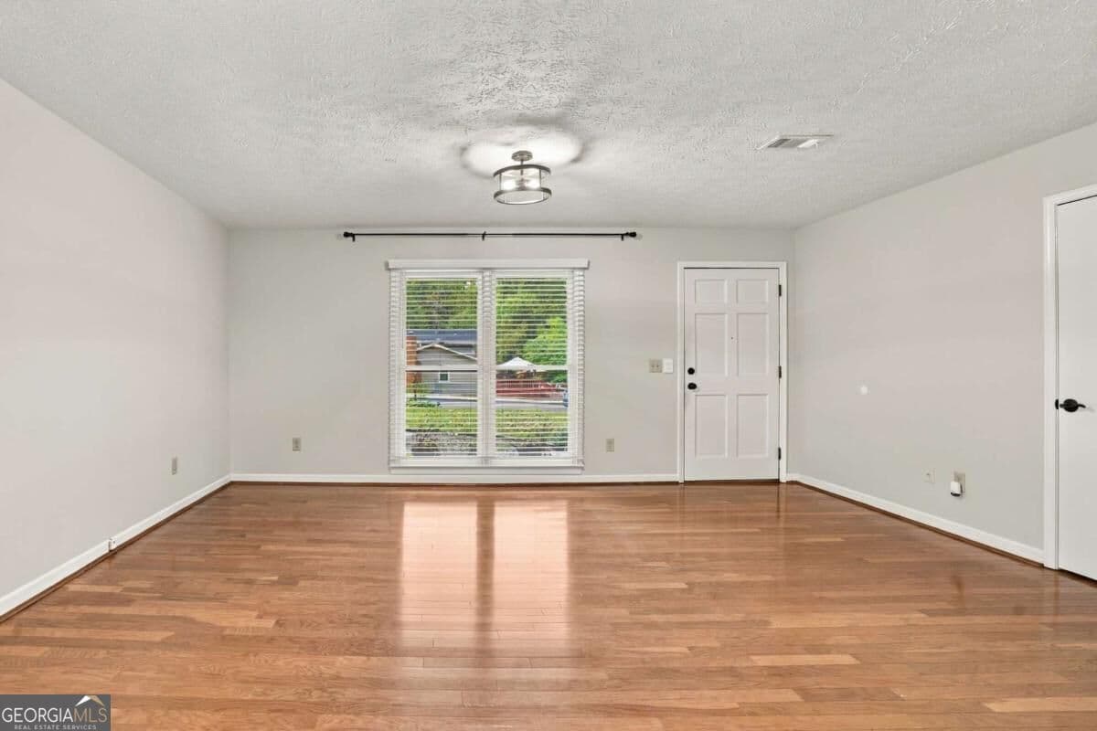 4 bedroom, 2 bathroom single family residence for rent at 3095 Woodland Drive, Kennesaw, GA 30152 for $2,300 a month — photo 8