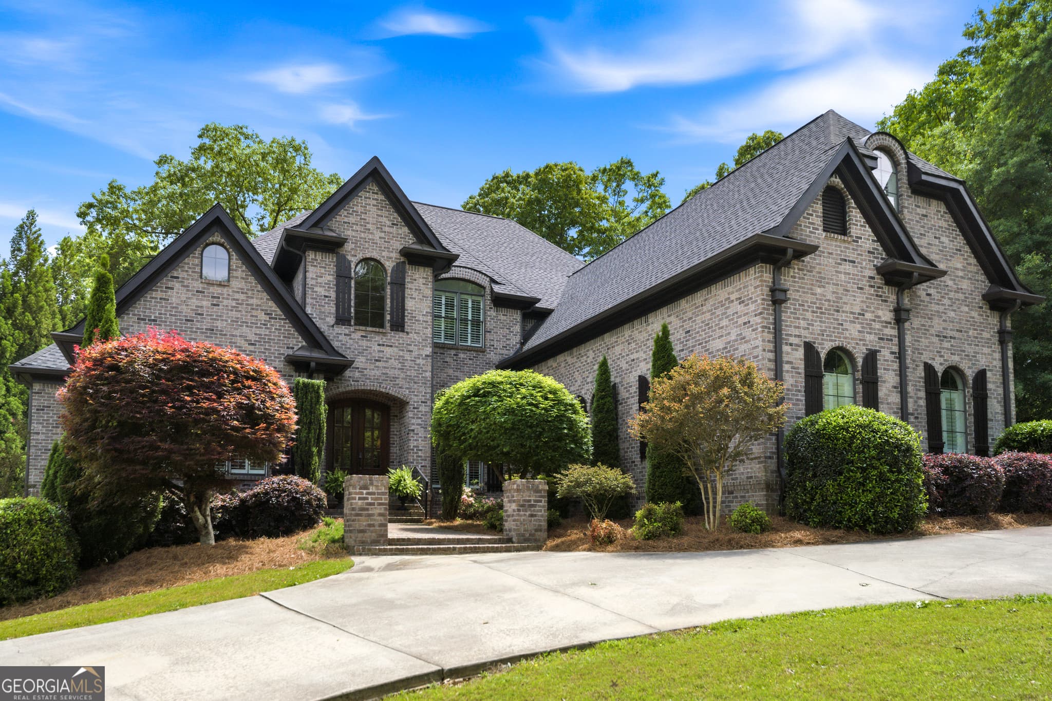 6 bedroom, 6 bathroom, 9,013 sq ft single family residence sold at 1720 Oak Tree Hollow, Gainesville, GA 30501
