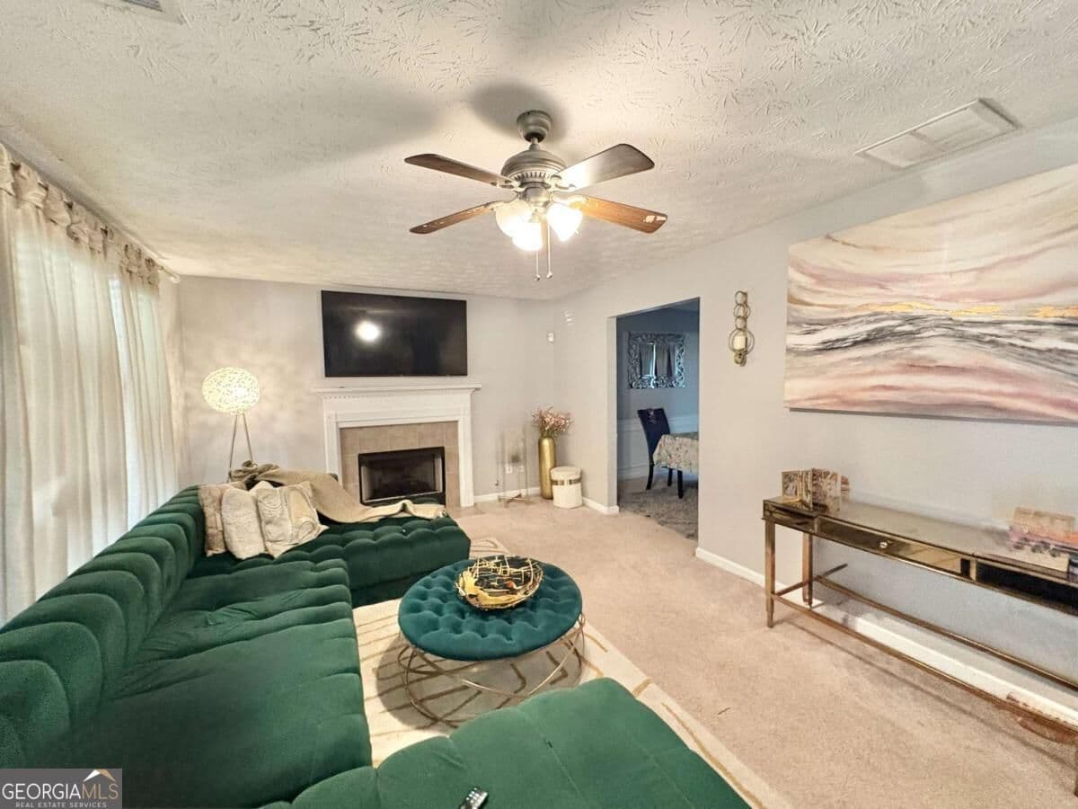 4 bedroom, 2.5 bathroom, 1,850 sq ft single family residence for sale at 921 Tucker Lane, Loganville, GA 30052 — photo 3