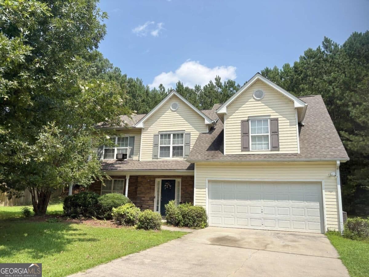 4 bedroom, 2.5 bathroom, 1,850 sq ft single family residence for sale at 921 Tucker Lane, Loganville, GA 30052 — photo 1 of 21