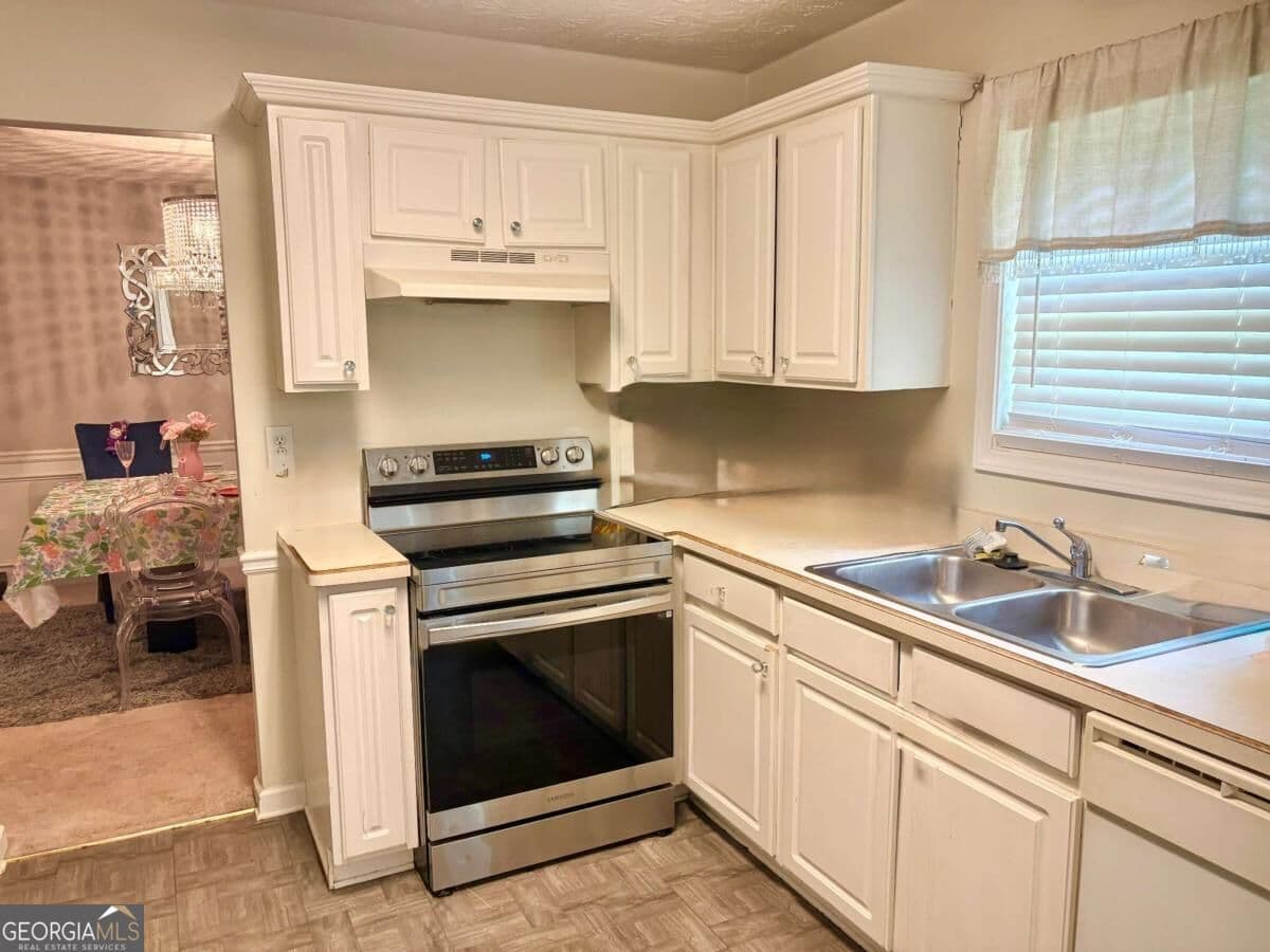 4 bedroom, 2.5 bathroom, 1,850 sq ft single family residence for sale at 921 Tucker Lane, Loganville, GA 30052 — photo 4