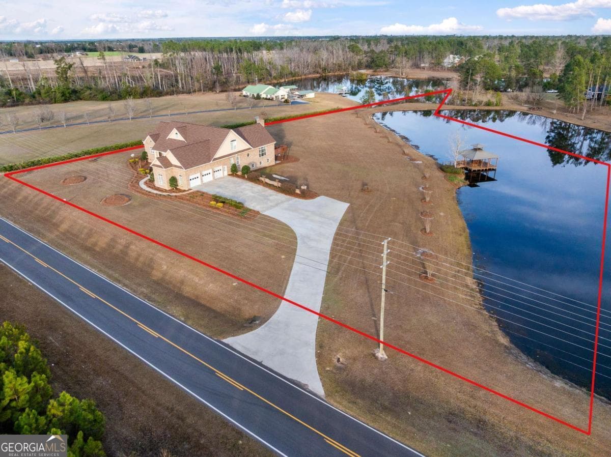 4 bedroom, 4.5 bathroom, 6,044 sq ft single family residence for sale at 42 Claxton Road, Hazlehurst, GA 31539 — photo 3