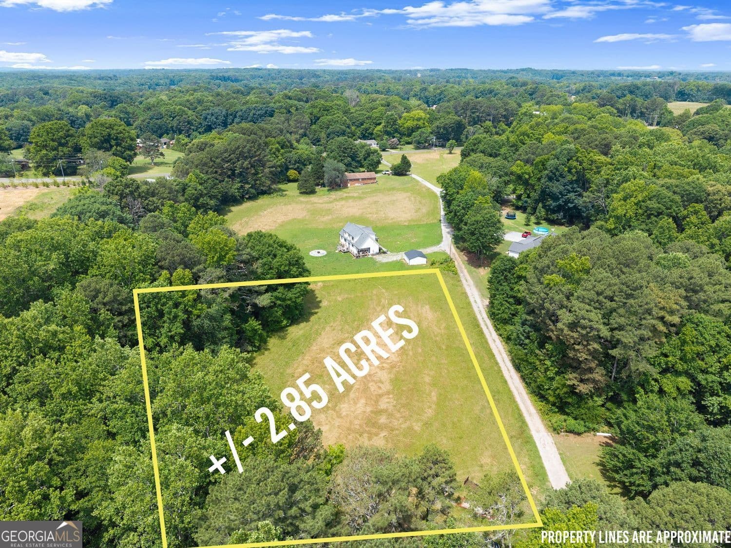 unimproved land for sale at 0 Howard Road, Cumming, GA 30040 — photo 1 of 15