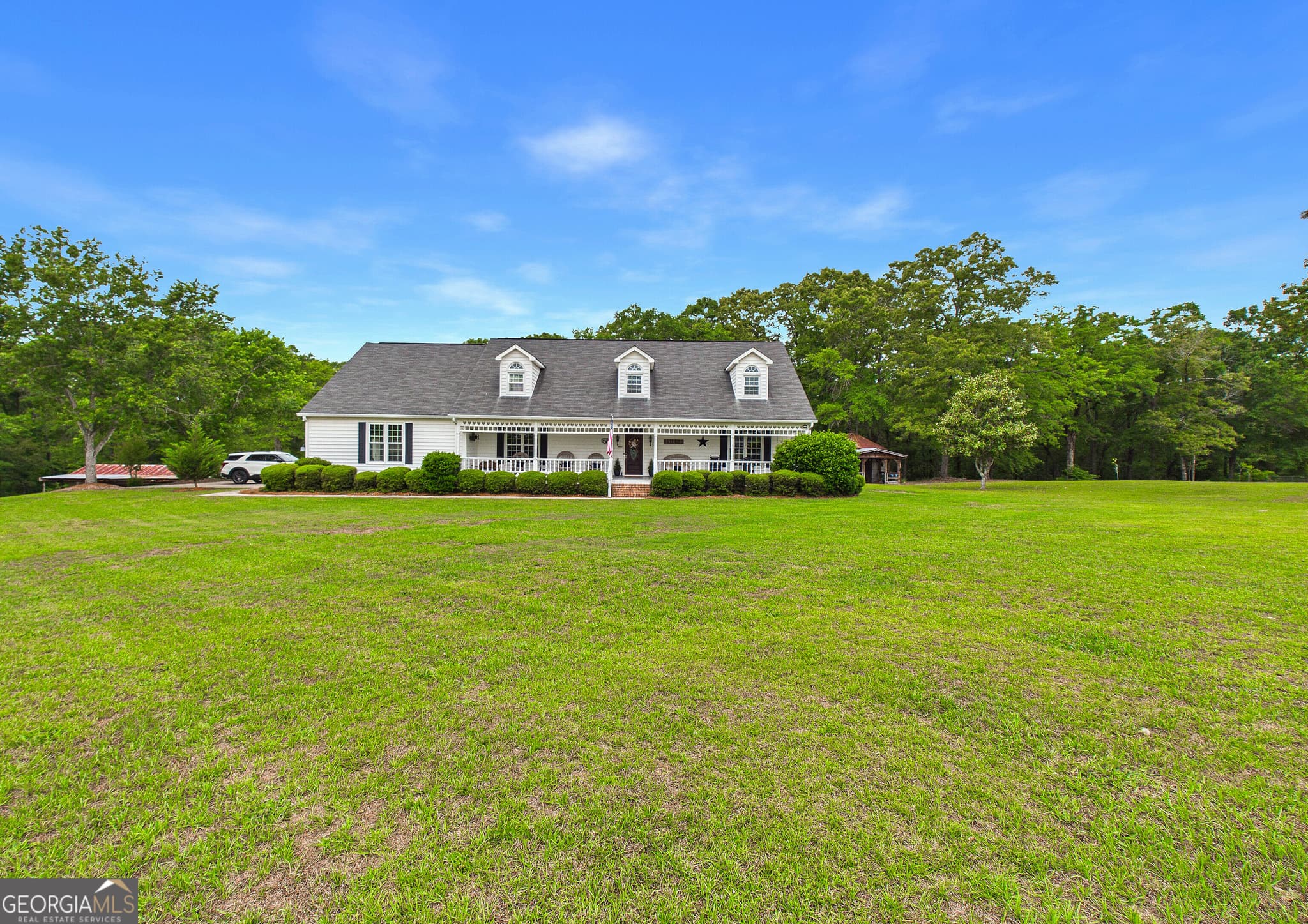 4 bedroom, 4 bathroom, 4,158 sq ft single family residence for sale at 5771 Rogers Road, Lizella, GA 31052 — photo 4