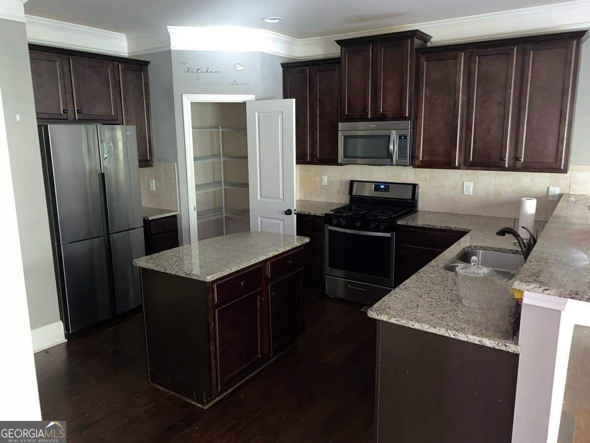 5 bedroom, 3.5 bathroom, 4,080 sq ft single family residence for sale at 5646 Whispering Pines Lane, Douglasville, GA 30135 — photo 10
