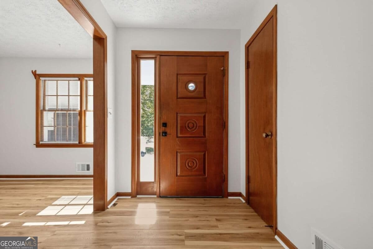 3 bedroom, 2 bathroom, 1,570 sq ft single family residence for sale at 4393 Hale Place, Lilburn, GA 30047 — photo 5