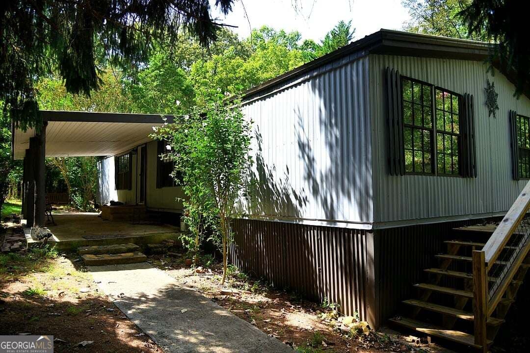 4 bedroom, 2 bathroom, 1,440 sq ft manufactured home,single family residence for sale at 7 Medford Lane, Blairsville, GA 30512 — photo 1 of 20