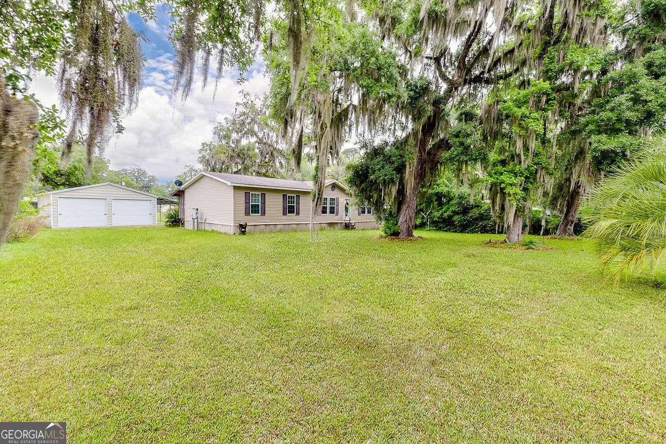 3 bedroom, 2 bathroom, 1,792 sq ft manufactured home,single family residence sold at 1110 New Shellman Road, Townsend, GA 31331