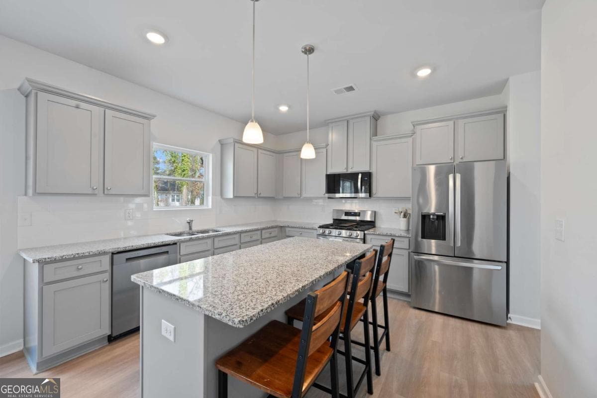4 bedroom, 2.5 bathroom, 2,667 sq ft single family residence for sale at 1441 Stephens View Drive, Loganville, GA 30052 — photo 3