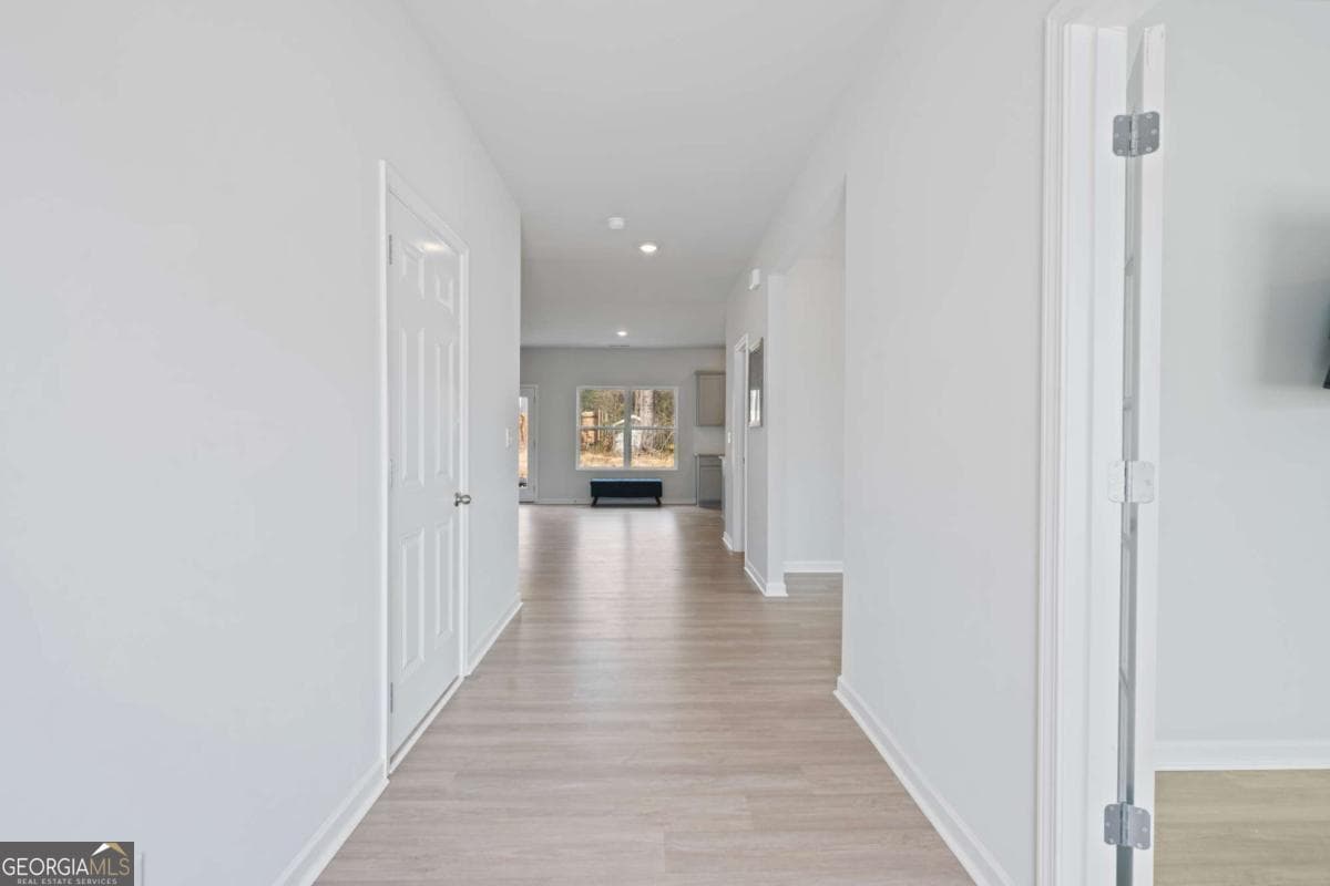 4 bedroom, 2.5 bathroom, 2,667 sq ft single family residence for sale at 1441 Stephens View Drive, Loganville, GA 30052 — photo 8