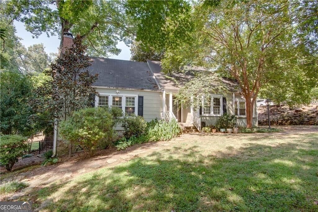 4 bedroom, 2 bathroom, 1,881 sq ft single family residence for sale at 2743 Kimmeridge Drive, East Point, GA 30344 — photo 3