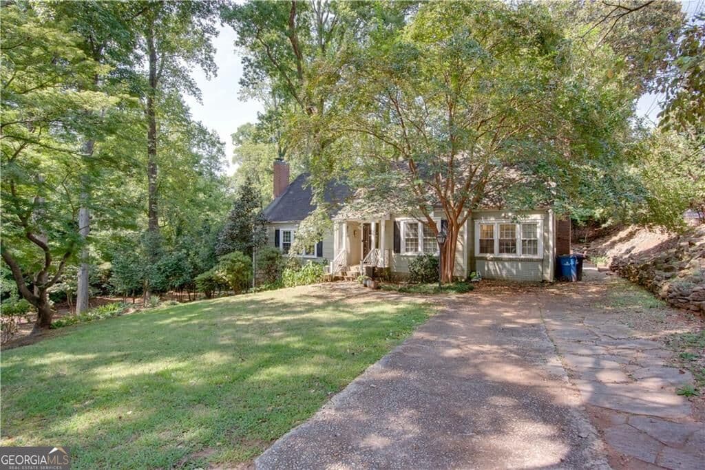 4 bedroom, 2 bathroom, 1,881 sq ft single family residence for sale at 2743 Kimmeridge Drive, East Point, GA 30344 — photo 1 of 47