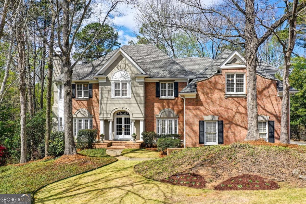 5 bedroom, 4.5 bathroom, 6,605 sq ft single family residence for sale at 940 Waters Reach Court, Alpharetta, GA 30022 — photo 1 of 84