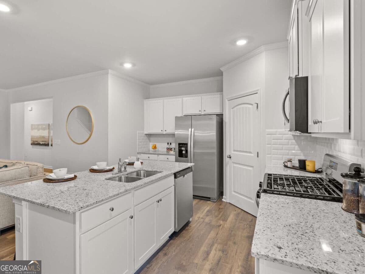 4 bedroom, 2.5 bathroom, 2,125 sq ft townhouse for sale at 4810 Guava Trace, Acworth, GA 30101 — photo 7