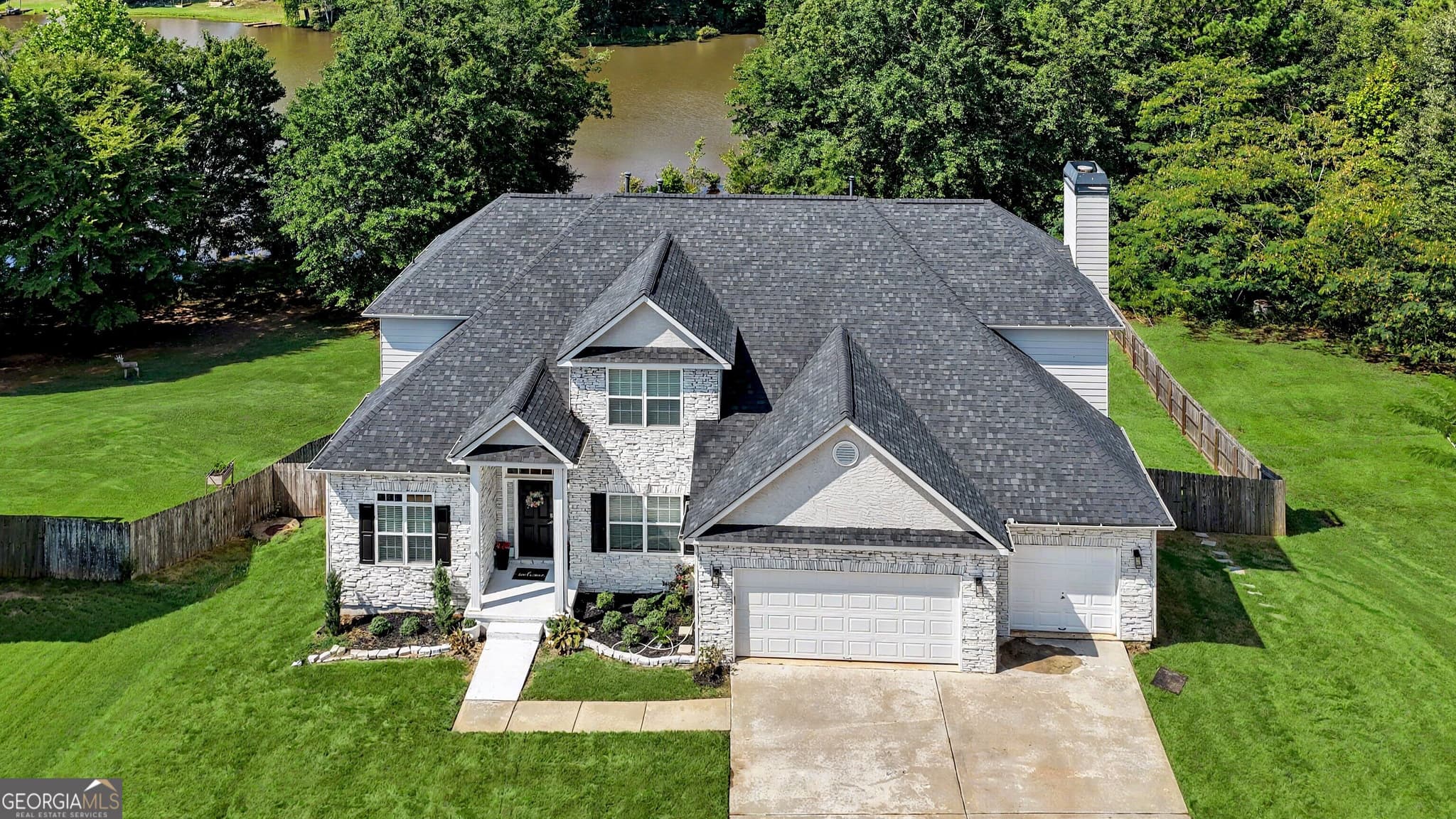 5 bedroom, 3.5 bathroom, 4,363 sq ft single family residence for sale at 2048 Reserve Parkway, Mcdonough, GA 30253 — photo 1 of 96