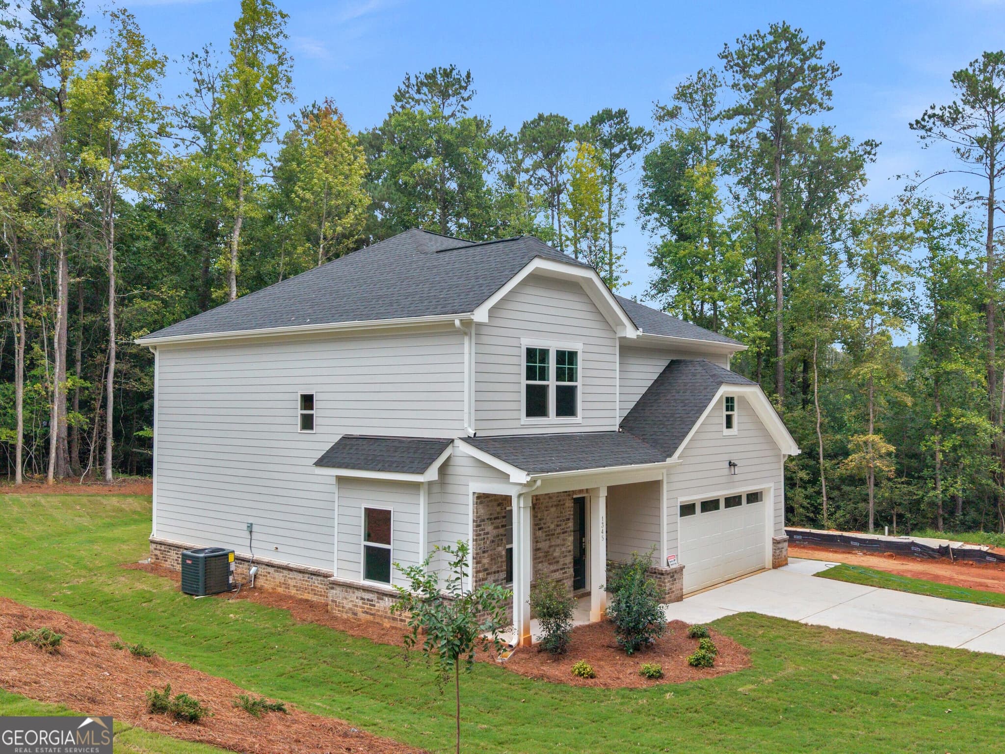 4 bedroom, 2.5 bathroom, 2,233 sq ft single family residence for sale at 1345 Johnson Road, Conyers, GA 30094 — photo 3
