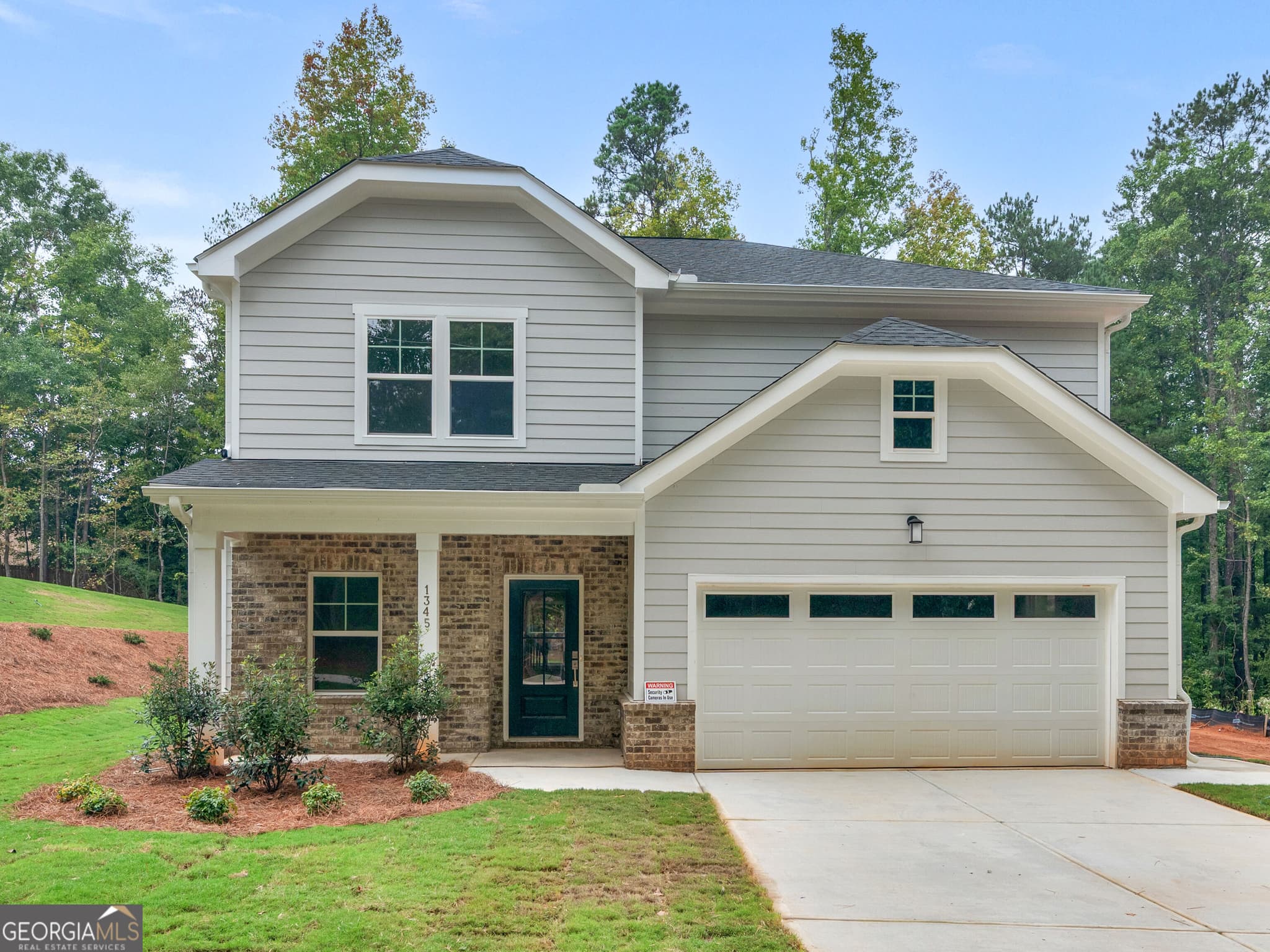 4 bedroom, 2.5 bathroom, 2,233 sq ft single family residence for sale at 1345 Johnson Road, Conyers, GA 30094 — photo 1 of 35