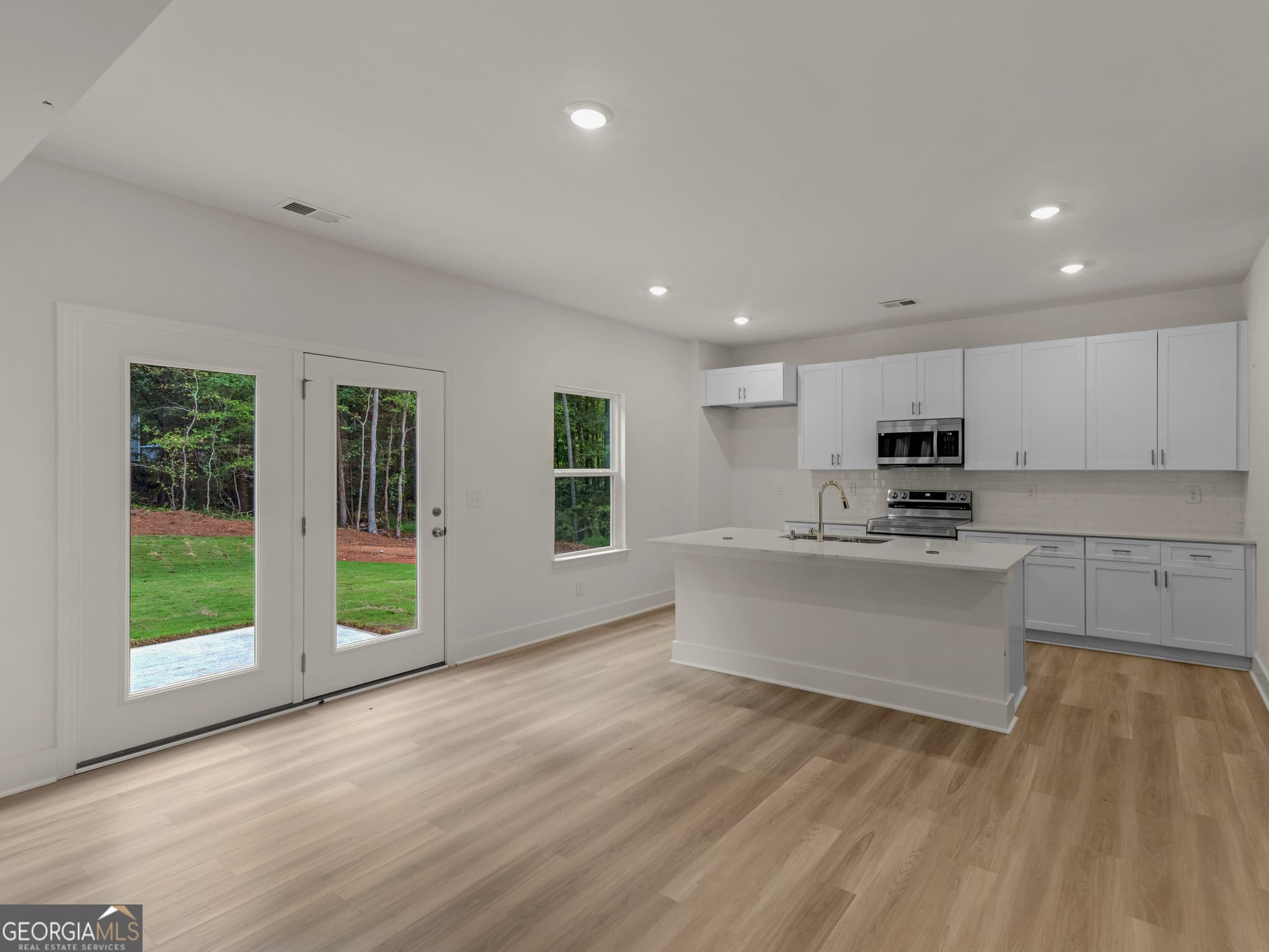 4 bedroom, 2.5 bathroom, 2,233 sq ft single family residence for sale at 1345 Johnson Road, Conyers, GA 30094 — photo 9
