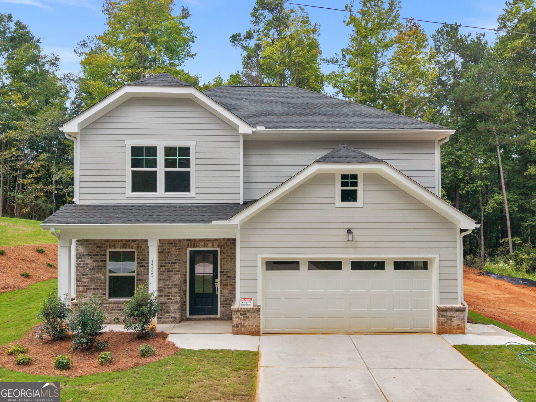 4 bedroom, 2.5 bathroom, 2,233 sq ft single family residence for sale at 1345 Johnson Road, Conyers, GA 30094 — photo 4