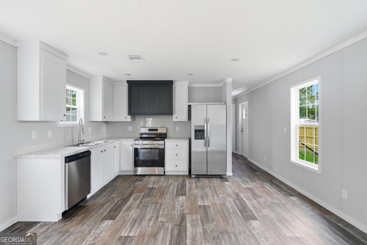 3 bedroom, 2 bathroom, 960 sq ft manufactured home,single family residence for sale at 94 Thrasher Lane, Jesup, GA 31545 — photo 6