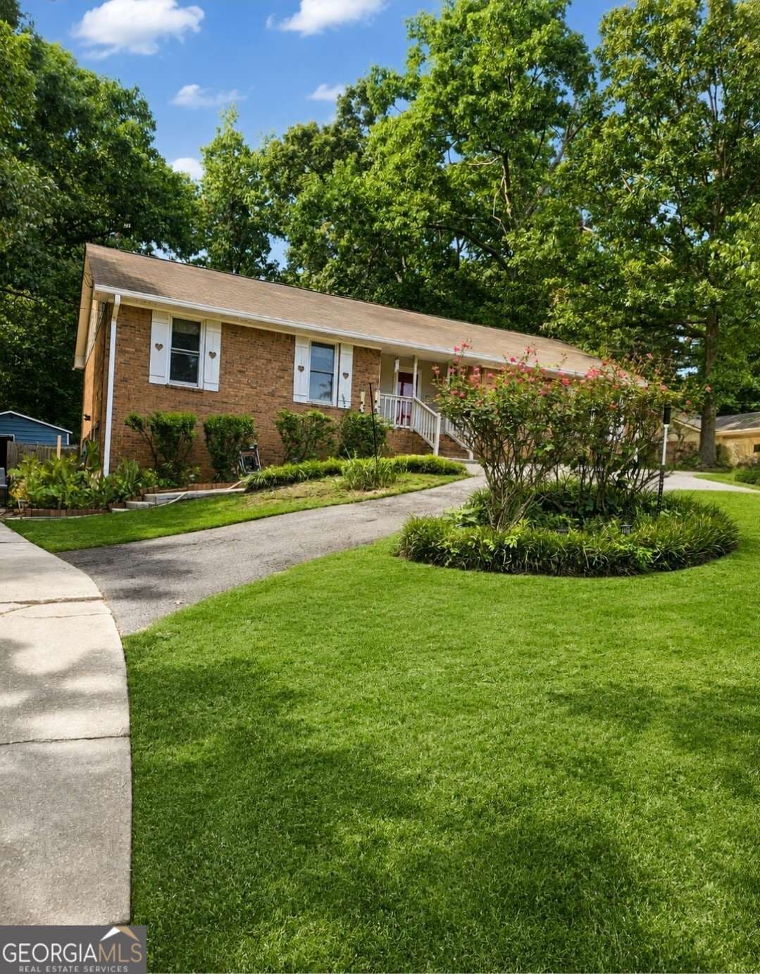 4 bedroom, 3 bathroom single family residence for sale at 1788 Brandy Woods Drive, Conyers, GA 30013 — photo 1 of 32