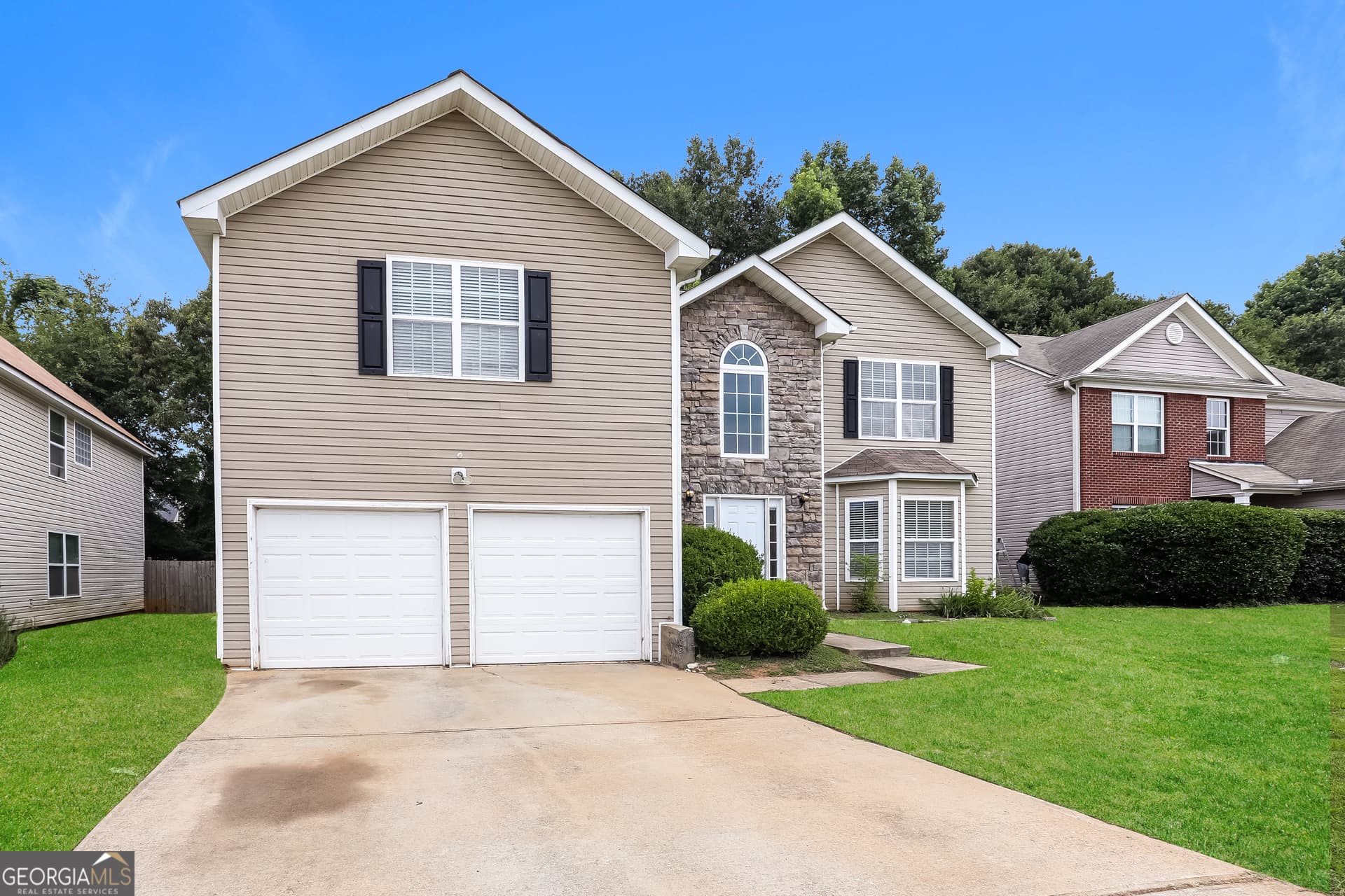 4 bedroom, 2.5 bathroom, 2,359 sq ft single family residence for sale at 11627 Kades Trail, Hampton, GA 30228 — photo 2