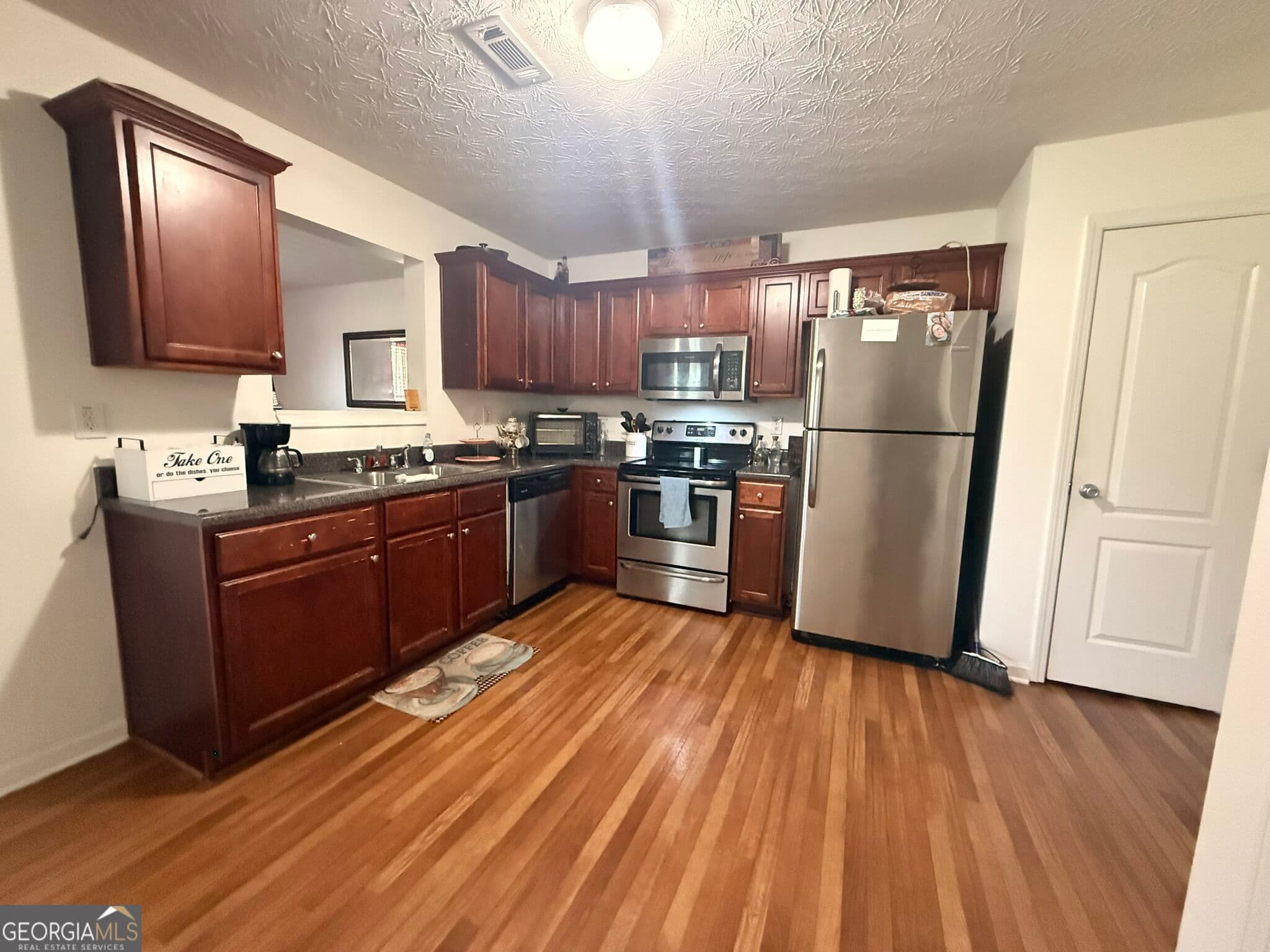 4 bedroom, 2.5 bathroom, 1,807 sq ft single family residence for sale at 6869 Lockley Court, Rex, GA 30273 — photo 7