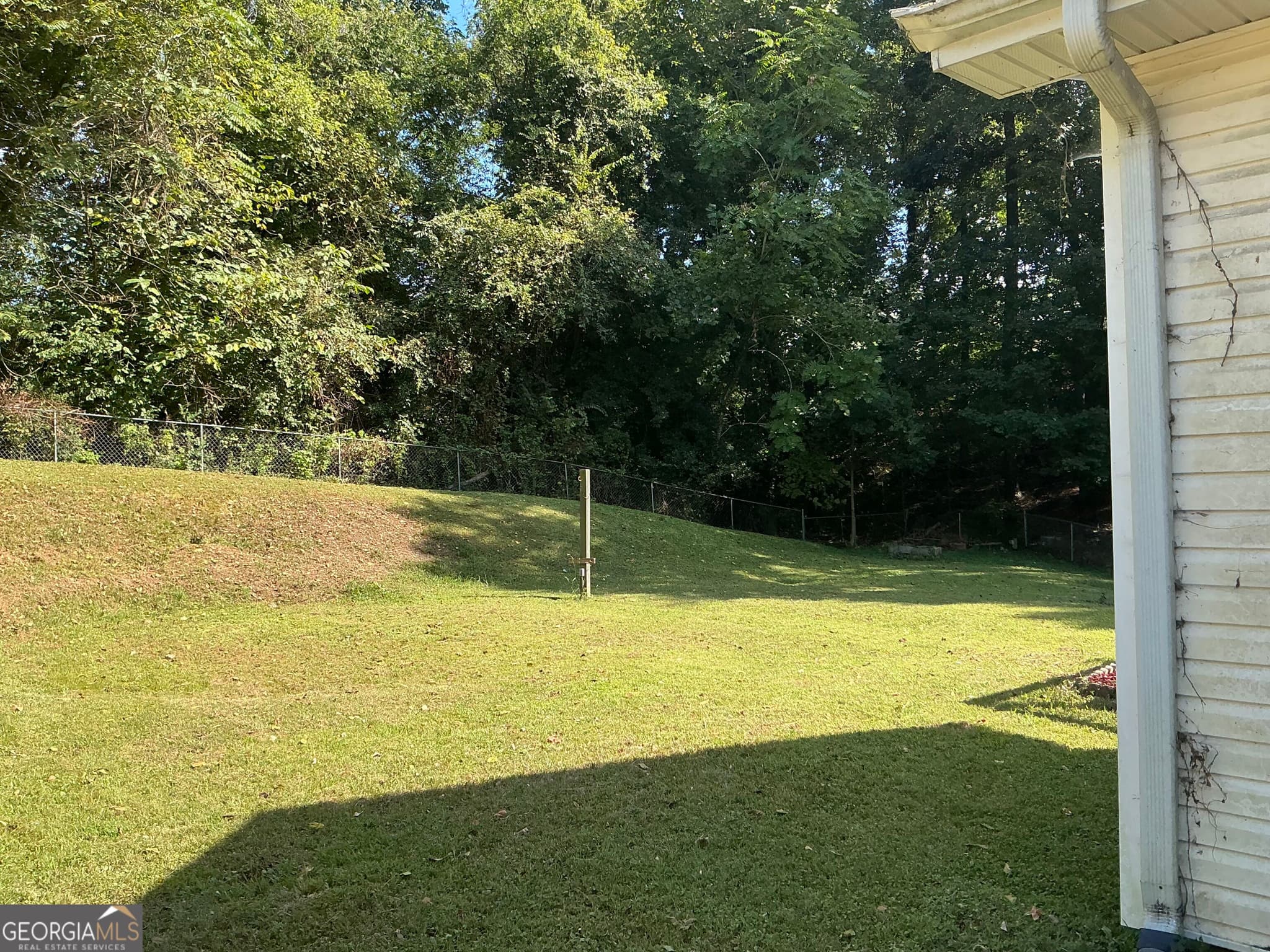 4 bedroom, 3 bathroom, 3,436 sq ft single family residence for sale at 101 S Azalea Drive, Lafayette, GA 30728 — photo 3