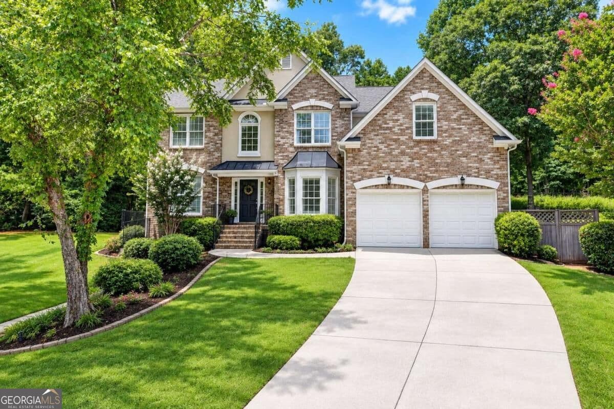 7 bedroom, 4 bathroom, 3,874 sq ft single family residence for sale at 3270 Royal Creek Way, Lilburn, GA 30047 — photo 2