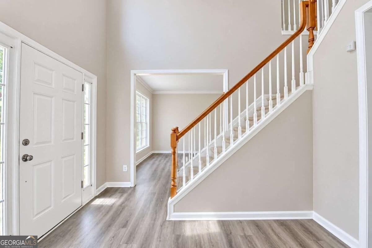 7 bedroom, 4 bathroom, 3,874 sq ft single family residence for sale at 3270 Royal Creek Way, Lilburn, GA 30047 — photo 6
