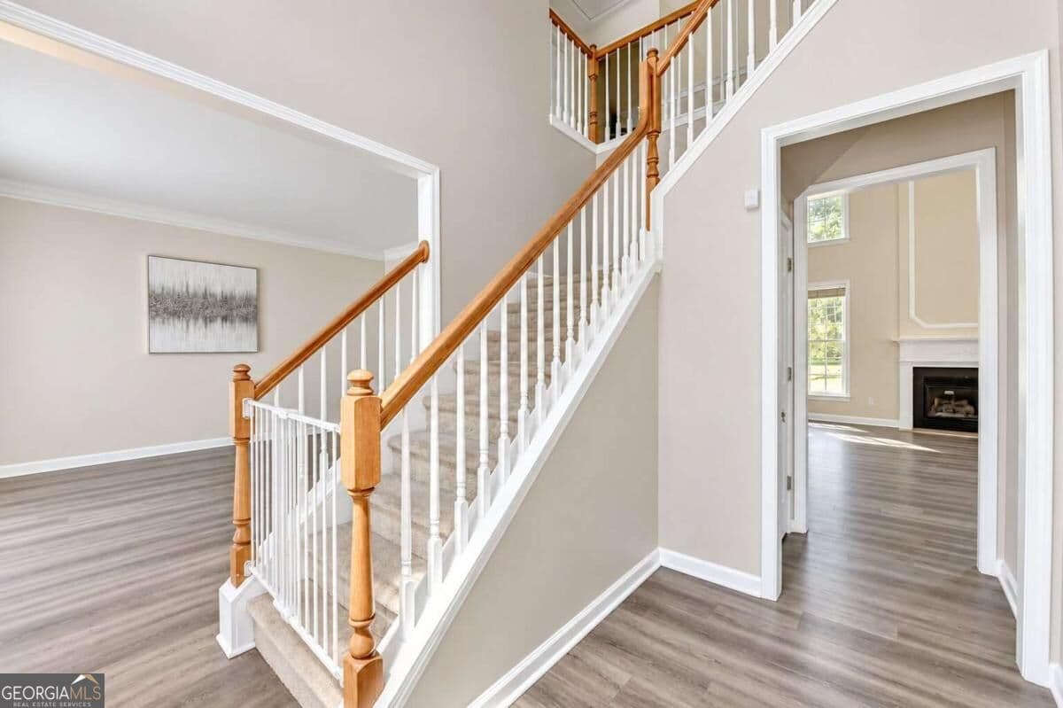 7 bedroom, 4 bathroom, 3,874 sq ft single family residence for sale at 3270 Royal Creek Way, Lilburn, GA 30047 — photo 7
