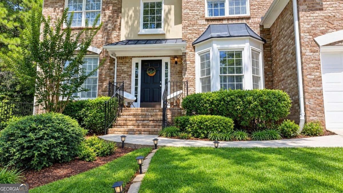 7 bedroom, 4 bathroom, 3,874 sq ft single family residence for sale at 3270 Royal Creek Way, Lilburn, GA 30047 — photo 5