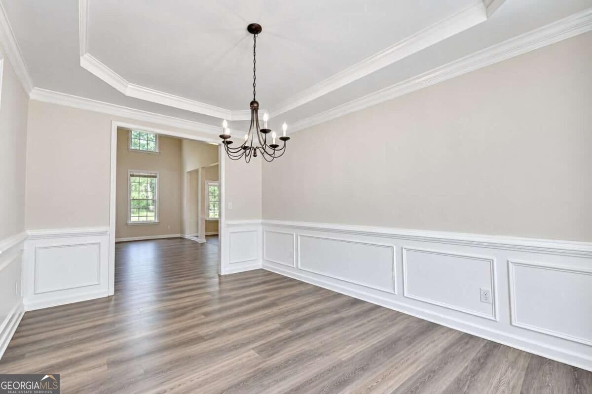 7 bedroom, 4 bathroom, 3,874 sq ft single family residence for sale at 3270 Royal Creek Way, Lilburn, GA 30047 — photo 9