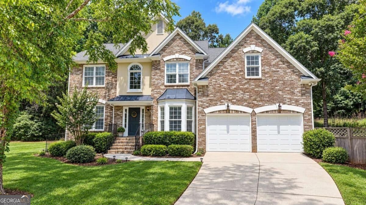 7 bedroom, 4 bathroom, 3,874 sq ft single family residence for sale at 3270 Royal Creek Way, Lilburn, GA 30047 — photo 4