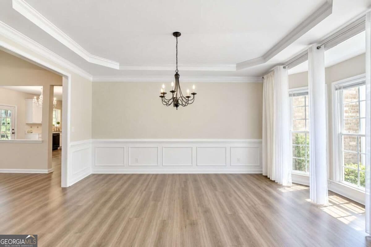 7 bedroom, 4 bathroom, 3,874 sq ft single family residence for sale at 3270 Royal Creek Way, Lilburn, GA 30047 — photo 8