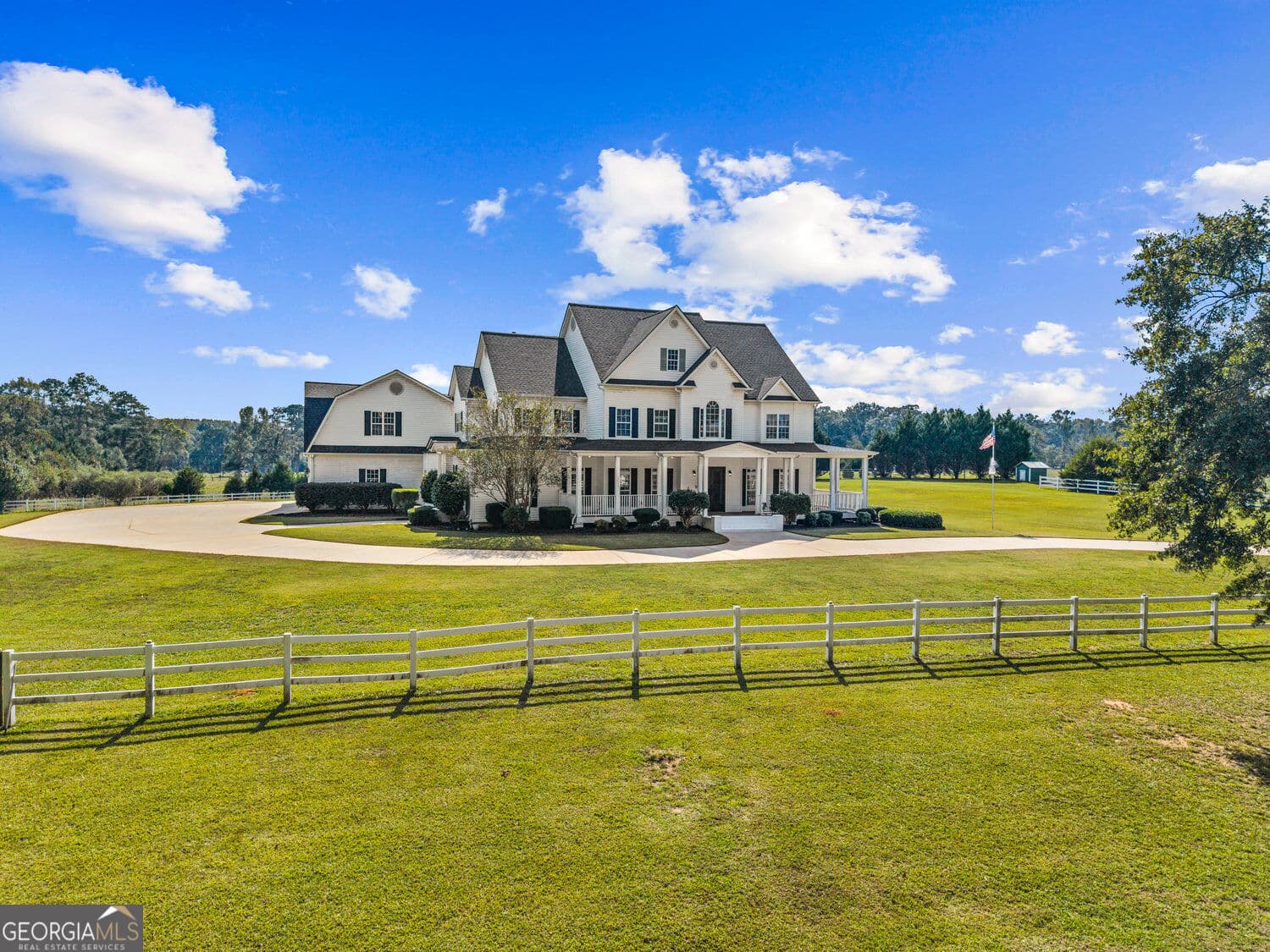 7 bedroom, 6.5 bathroom, 9,343 sq ft single family residence for sale at 1815 Drew Allen Road, Williamson, GA 30292 — photo 2