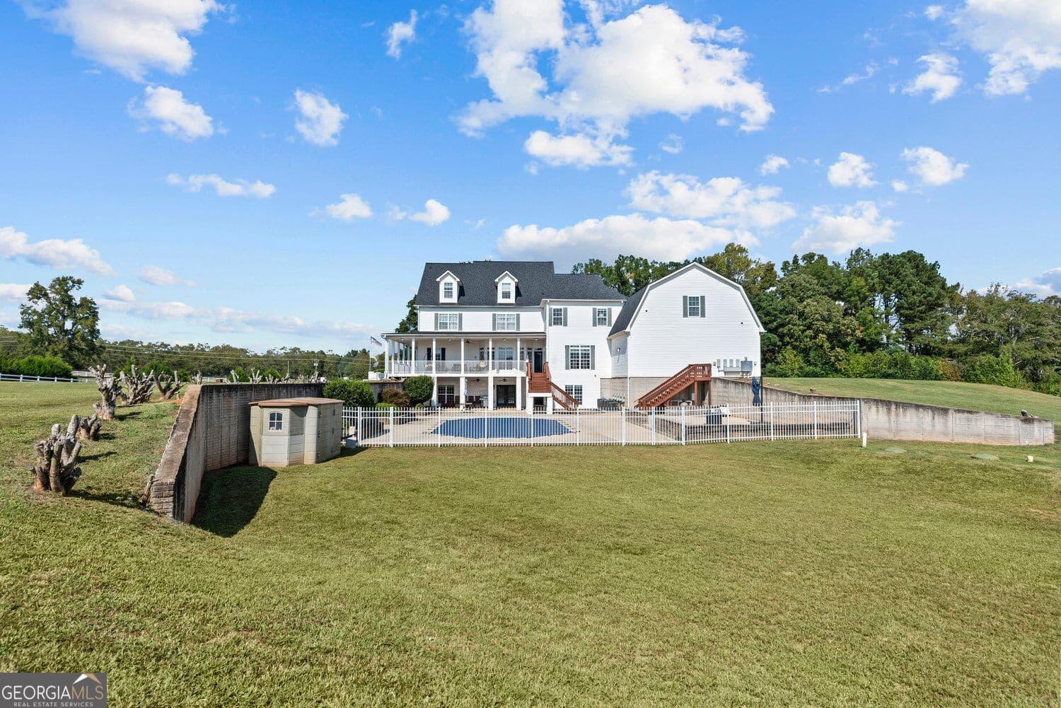 7 bedroom, 6.5 bathroom, 9,343 sq ft single family residence for sale at 1815 Drew Allen Road, Williamson, GA 30292 — photo 9