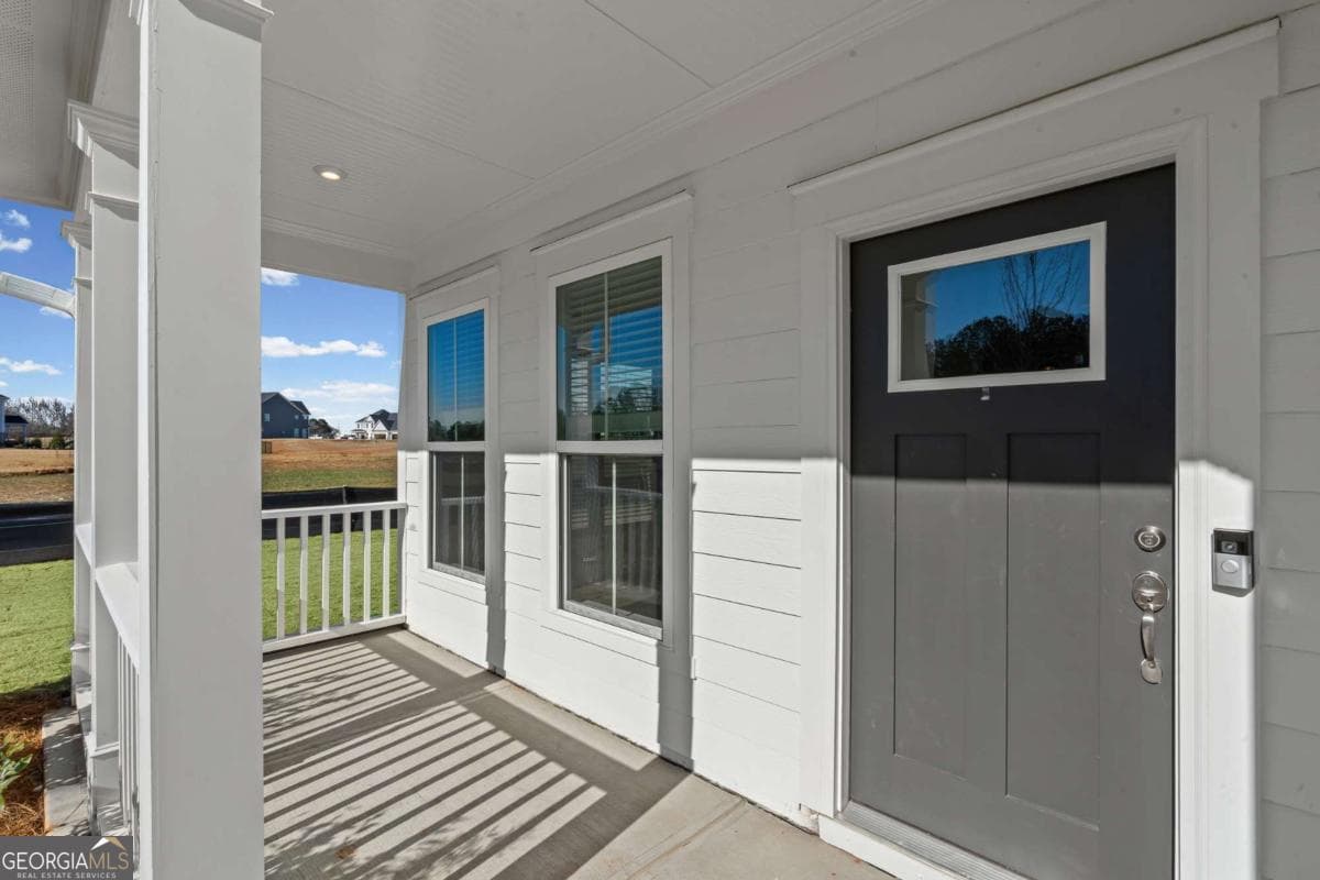 5 bedroom, 4.5 bathroom, 3,135 sq ft single family residence for sale at 363 Aidens Bluff, Hoschton, GA 30548 — photo 4