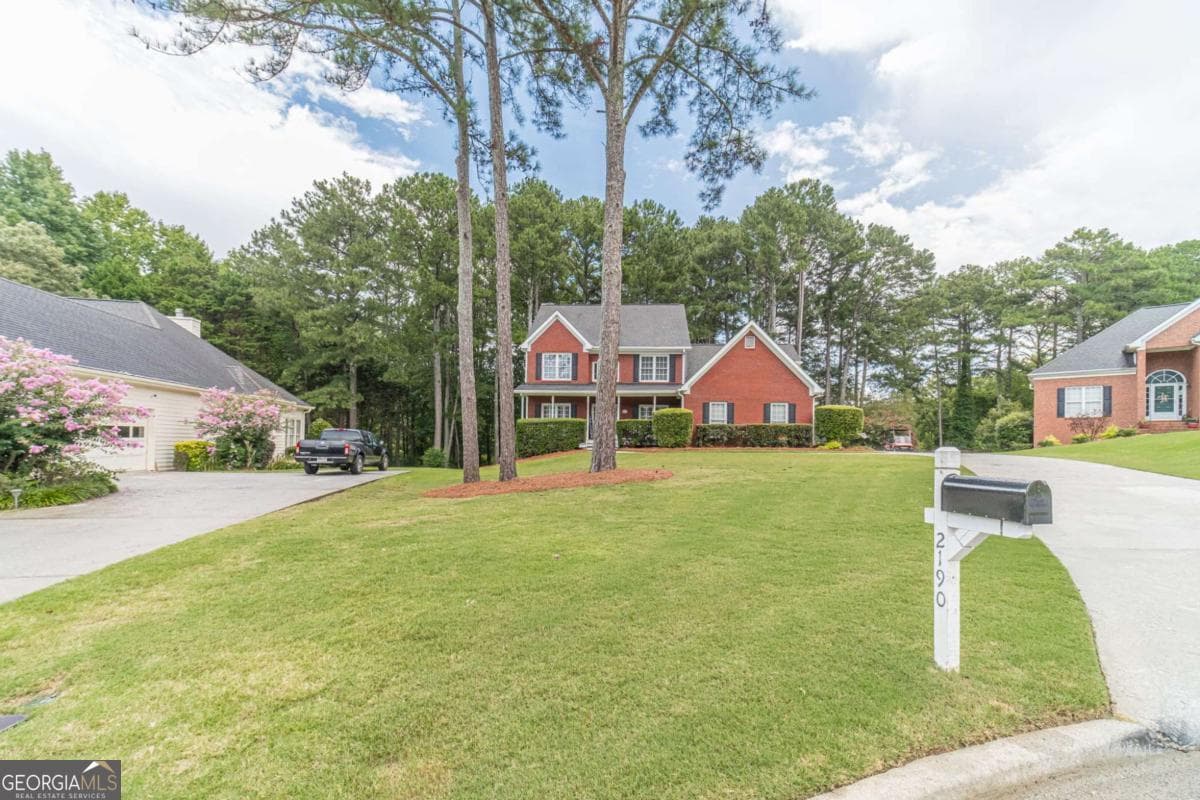 4 bedroom, 2.5 bathroom, 2,666 sq ft single family residence for sale at 2190 Rosie Lane, Snellville, GA 30078 — photo 2