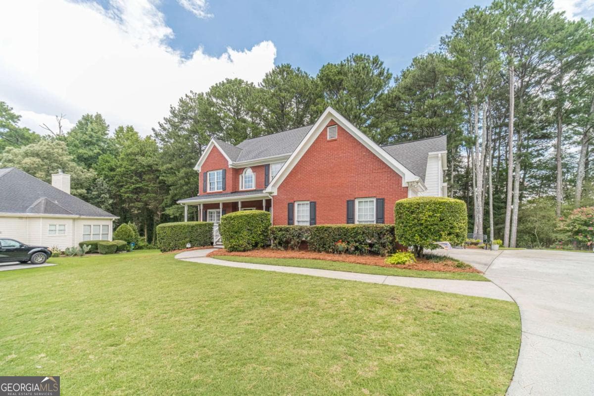 4 bedroom, 2.5 bathroom, 2,666 sq ft single family residence for sale at 2190 Rosie Lane, Snellville, GA 30078 — photo 4