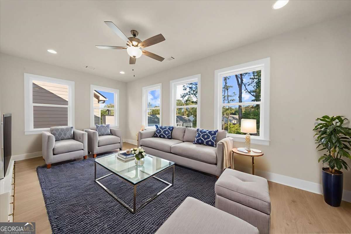 4 bedroom, 3 bathroom single family residence for sale at 5582 Overview Drive, Flowery Branch, GA 30542 — photo 6