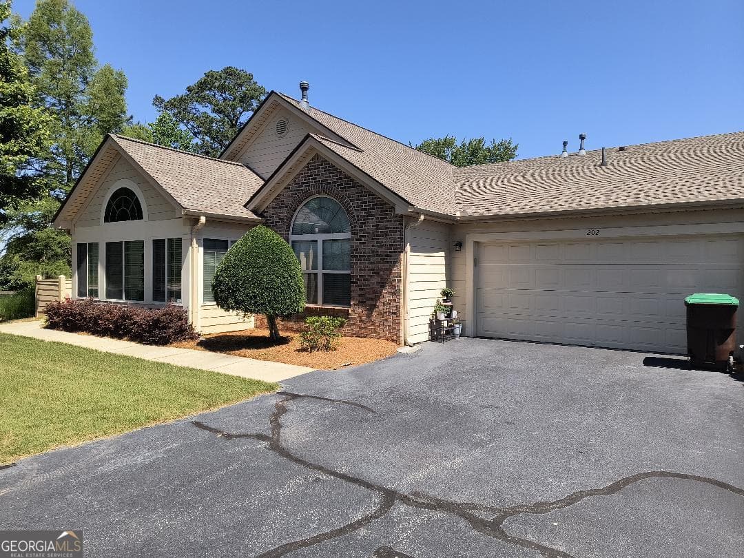 2 bedroom, 2 bathroom, 1,775 sq ft condominium sold at 202 Silver Summit Drive, Conyers, GA 30094