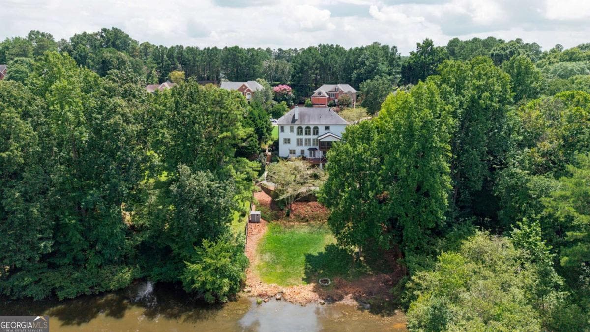 6 bedroom, 4 bathroom, 4,738 sq ft single family residence for sale at 5001 Preservation Pointe, Kennesaw, GA 30152 — photo 6